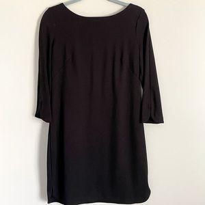 Vince Camuto size 8 black shift dress. 3/4 length sleeves. Silver zipper back.